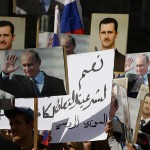 Manifestación en apoyo a Bashar al-Assad y a la ofensiva rusa en Siria. Poco después dos cohetes cayeron en la embajada rusa. (LOUAI BESHARA/AFP/Getty Images)